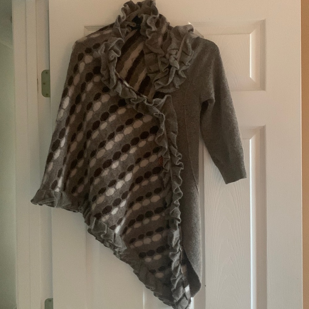 Sweater sleeve one arm and Shaw other. Bought from Anthropologie. Tan/ Brown